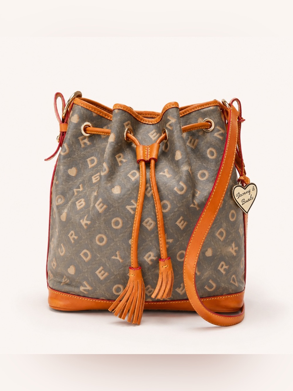 Dooney & Bourke Signature Monogram Drawstring Bucket Tassel Cinch Bag